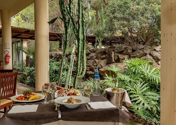 Отель Club Esse Palmasera Кала-Гононе